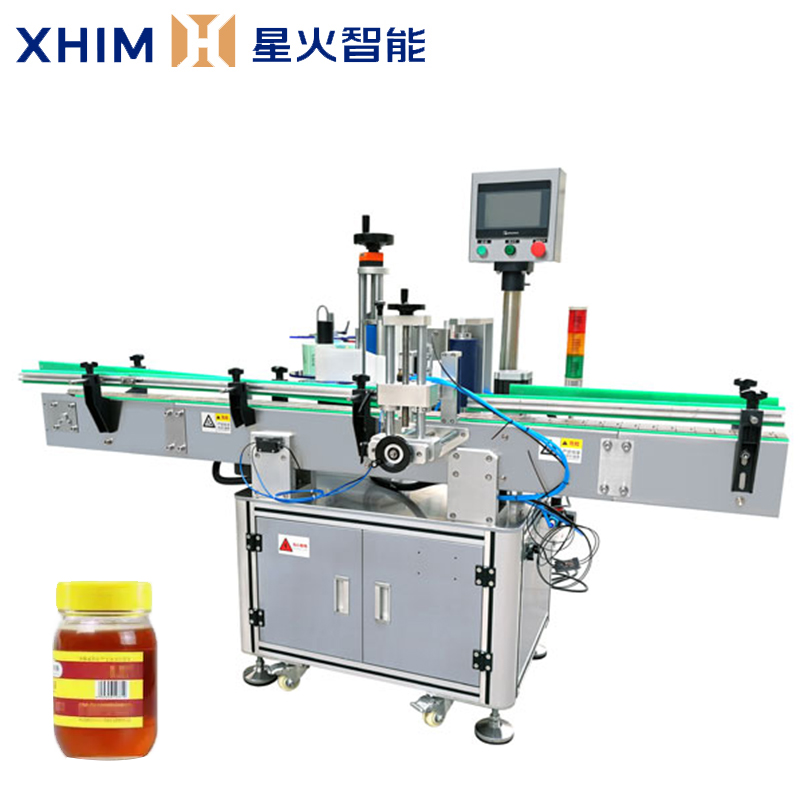 全自動圓瓶貼標機-智能定位貼（tiē）標機