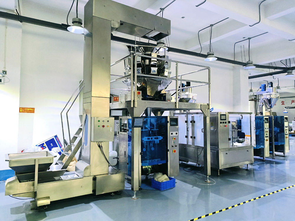 多頭組合稱顆粒（lì）包裝機  水餃（jiǎo）丸子自動